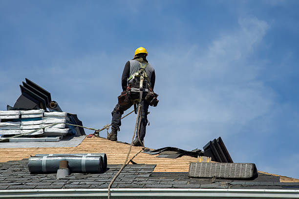 Professional Roofing technician working in North Kingstown, RI
